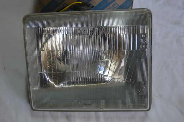 Ref: 5935965 Farol da Frente Fiat 127 3ª Serie NOVO