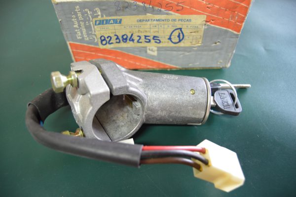 Ref. 82384255 Tranca Direção com Ignição Lancia NOVO