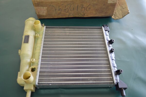 Ref: 7556136 Radiador - Fiat Uno NOVO